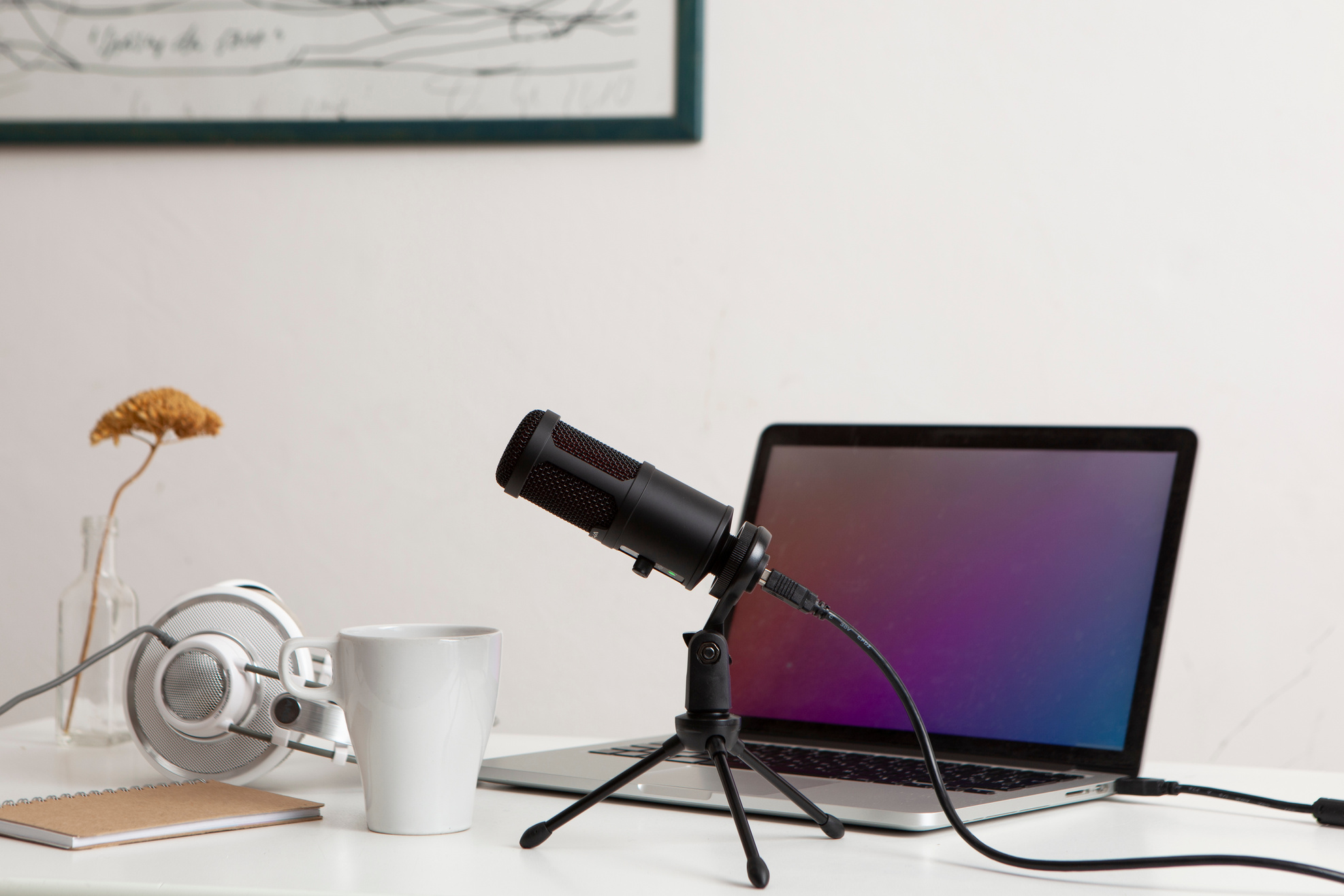Headphones, Microphone, Laptop and Notebook on White Desk